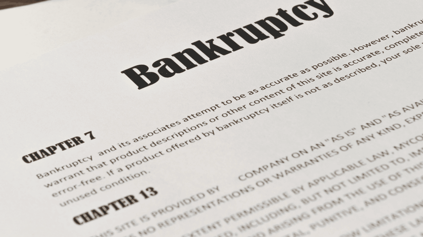Close-up of a bankruptcy document highlighting Chapter 7 and Chapter 13 bankruptcy options.